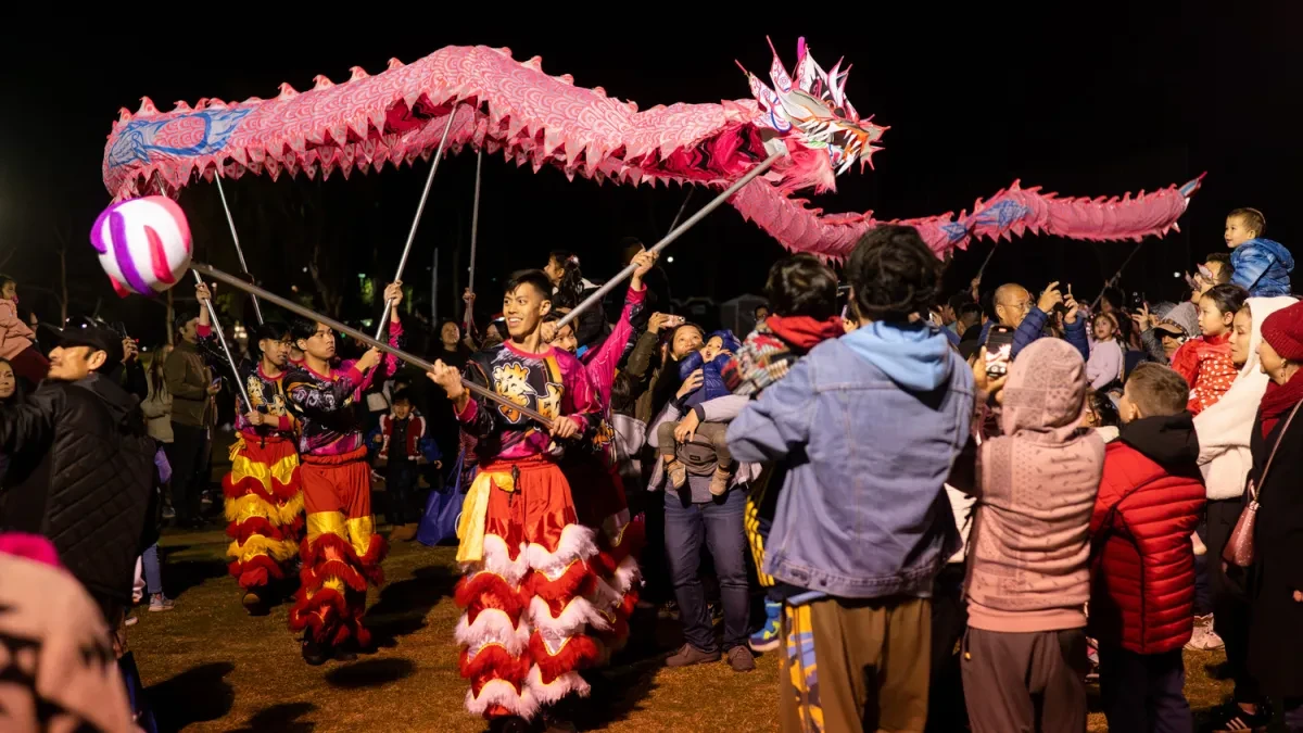 Qing Wei Cultural Troupe perform a lion and Dragon dance to cap off the night at the Tet Lunar New Year Festival in Santa Ana